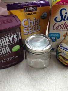 Unsweetend cocoa powder, mason jar, unsweetened cashew milk, agave, chia seeds